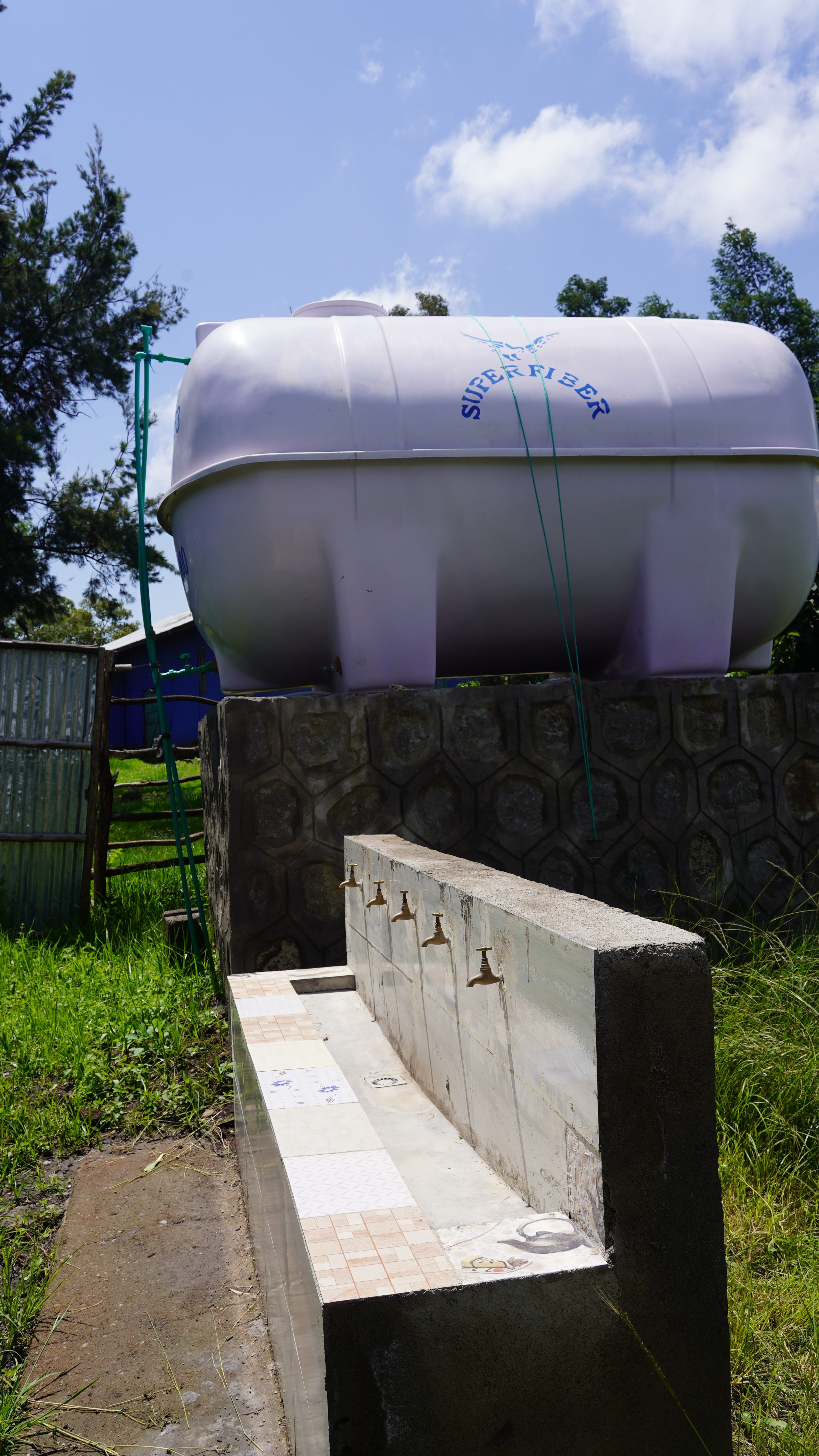Geja Bonaya school clean water Handwashing facility and water tank