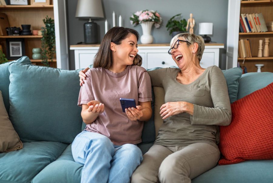 mom and daughter laughing